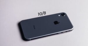 Black iPhone XR back showing its single 12MP camera and Apple logo