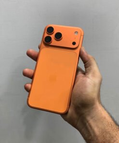 Rear panel view of a copper orange iPhone 17 Pro max non ptadisplaying the updated triple camera module and matte back glass.