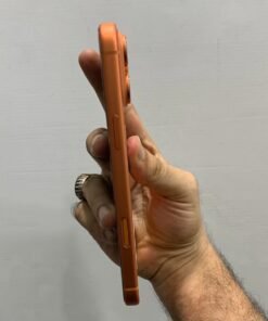 Right side profile of a copper orange iPhone 17 Pro max showing the metallic frame, power key, and Camera Control button.