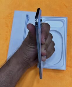 Right side profile of a Sky Blue iPhone 17 Air showcasing the side power button and flush capacitive Camera Control sensor.